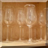 K94. Set of 12 plastic wine glasses. 9.5”h - $12 